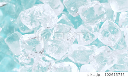 Super slow motion of rotating ice cubes, top view shot Super slow motion of rotating ice cubes, top view shot 102613753