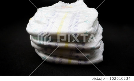 Baby diapers stacked each other on isolated background. Baby diapers stacked each other on isolated background. 102616234