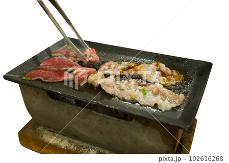 Top view of dice beef and Striped calf beef on the pan, focus selective 102616268