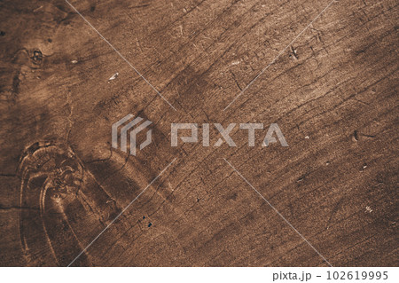 Old grunge background made of dark textured wood, surface made of old brown wood texture. A template for your design with space to copy. High quality photo 102619995