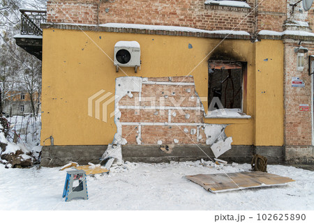 GOSTOMEL, UKRAINE - DECEMBER 02, 2022: Banksy graffiti theft from the wall of a house in Gostomel, Ukraine 102625890