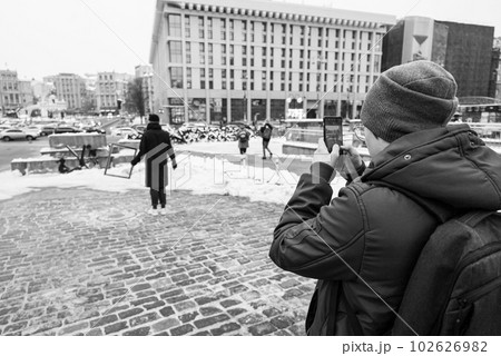 Creativity Banksy in the center of Kyiv, Ukraine on the Maidan, black and white photo 102626982