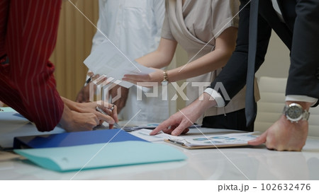 Business officer team consulting together with new project 102632476