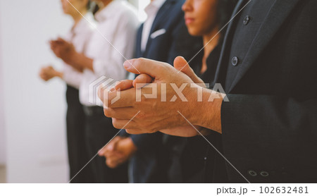 Happy business employees team celebrating success with praise in meeting room Happy business employees team celebrating success with praise in meeting room 102632481