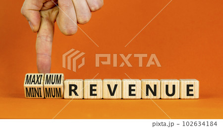 Maximum or minimum revenue symbol. Concept words Maximum revenue and Minimum revenue on wooden cubes. Beautiful orange table orange background. Business maximum or minimum revenue concept. Copy space. Maximum or minimum revenue symbol. Concept words Maximum revenue and Minimum revenue on wooden cubes. Beautiful orange table orange background. Business maximum or minimum revenue concept. Copy space. 102634184