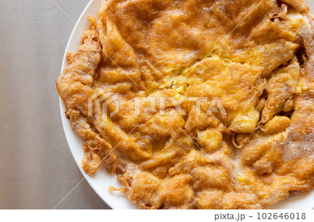 omelette on plate. Thai-style 102646018