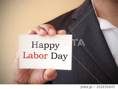 Happy labor day word on the white card 102650845