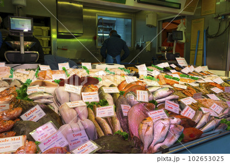 Amsterdam, Netherlands - Nov 29, 2019 : Food stall at Albert Cuyp Market in Amsterdam, Netherlands on Nov 29, 2019. 102653025