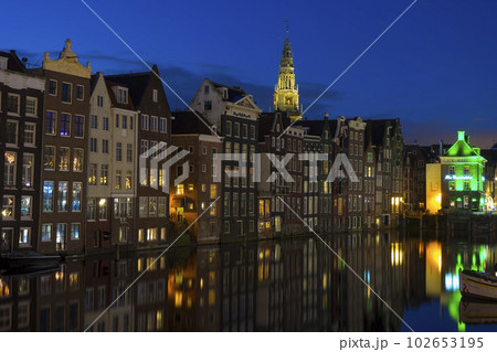 Dutch dancing houses at the Amsterdam canal in Holland. Dutch dancing houses at the Amsterdam canal in Holland. 102653195