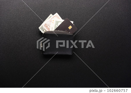 Wallet with money. Various banknotes in the wallet. Money and credit card. Wallet with money. Various banknotes in the wallet. Money and credit card. 102660757