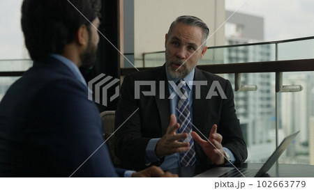 Businessman talking with company partner meeting to plan business project Businessman talking with company partner meeting to plan business project 102663779