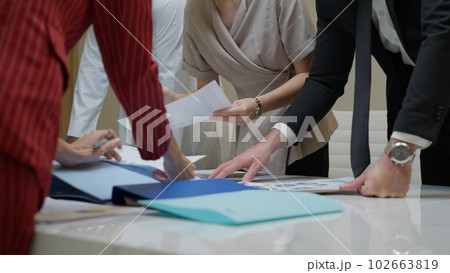 Business officer team consulting together with new project 102663819