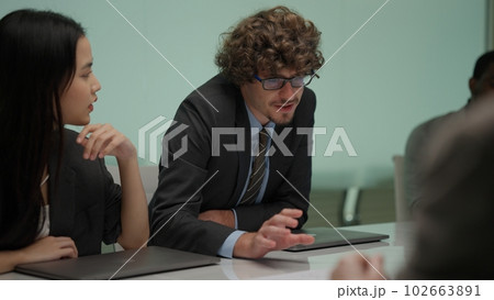 Young businesswoman talking with company partner co-worker team Young businesswoman talking with company partner co-worker team 102663891