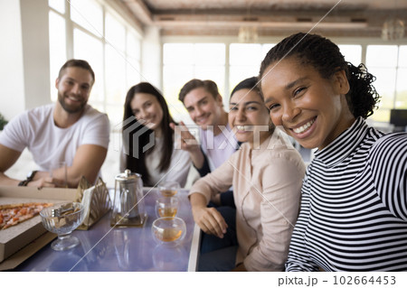 Friends staring at smartphone camera record video, make selfie pictures Friends staring at smartphone camera record video, make selfie pictures 102664453