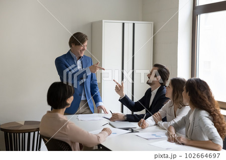 Happy mature boss agreed with subordinate opinion 102664697