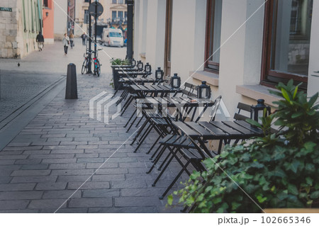 Street caffe in Krakow old town, Poland Street caffe in Krakow old town, Poland 102665346