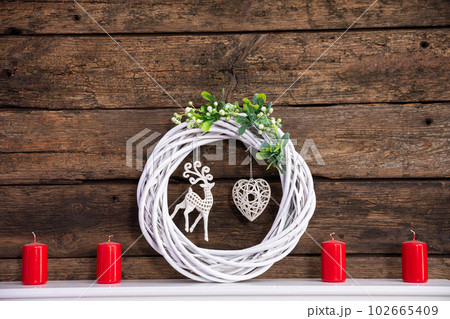 Christmas decoration on the background of old brown boards. Christmas decoration on the background of old brown boards. 102665409