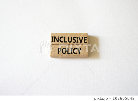 Inclusive policy symbol. Concept word Inclusive policy on wooden blocks. Beautiful white background. Business and Inclusive policy concept. Copy space Inclusive policy symbol. Concept word Inclusive policy on wooden blocks. Beautiful white background. Business and Inclusive policy concept. Copy space 102665648