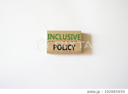 Inclusive policy symbol. Concept word Inclusive policy on wooden blocks. Beautiful white background. Business and Inclusive policy concept. Copy space Inclusive policy symbol. Concept word Inclusive policy on wooden blocks. Beautiful white background. Business and Inclusive policy concept. Copy space 102665650