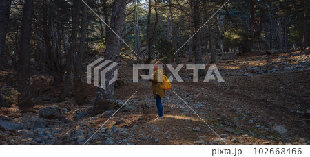caucasian woman enjoys being in nature, 102668466