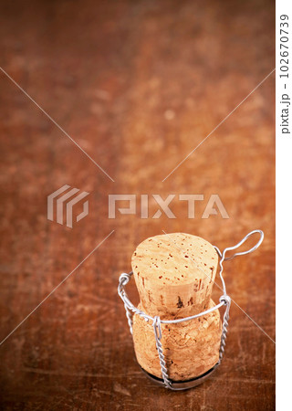 Old Dated wine bottle corks on the wooden background. Close up Vintage background with empty space for text Old Dated wine bottle corks on the wooden background. Close up Vintage background with empty space for text 102670739