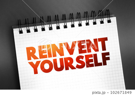 Reinvent Yourself text quote on notepad, concept background 102671849