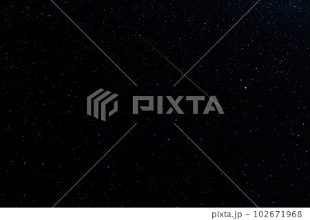 night starry sky and a passing meteorite. Background abstract image 102671968