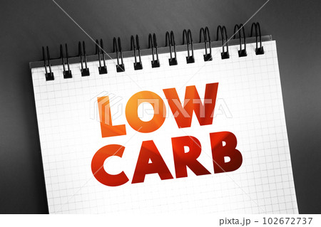 Low Carb - diet means that you eat fewer carbohydrates and a higher proportion of protein and fat, text concept on notepad Low Carb - diet means that you eat fewer carbohydrates and a higher proportion of protein and fat, text concept on notepad 102672737