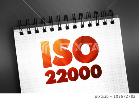 ISO 22000 - Food safety management system which provides requirements for organizations in the food industry, concept on notepad 102672782