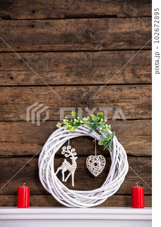 Christmas decoration on the background of old brown boards. Christmas decoration on the background of old brown boards. 102672895