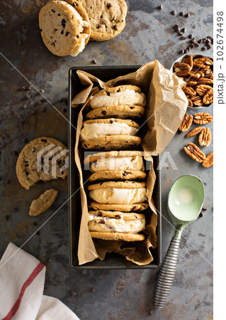 Ice cream sandwiches with chocolate chip cookies Ice cream sandwiches with chocolate chip cookies 102674498