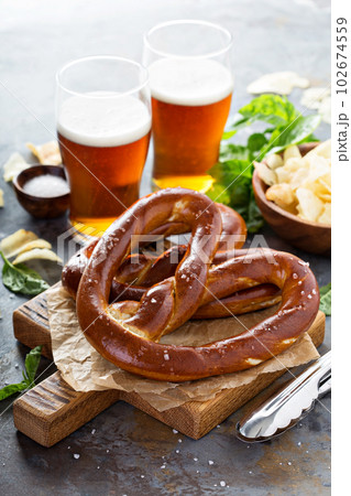 Freshly baked pretzels with beer 102674559