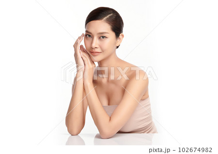 Beautiful young asian woman with clean fresh skin on white background, Face care, Facial treatment, Cosmetology, beauty and spa, Asian women portrait. Beautiful young asian woman with clean fresh skin on white background, Face care, Facial treatment, Cosmetology, beauty and spa, Asian women portrait. 102674982