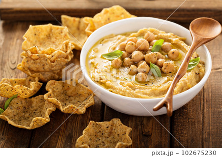 Homemade hummus with tortilla bowls 102675230