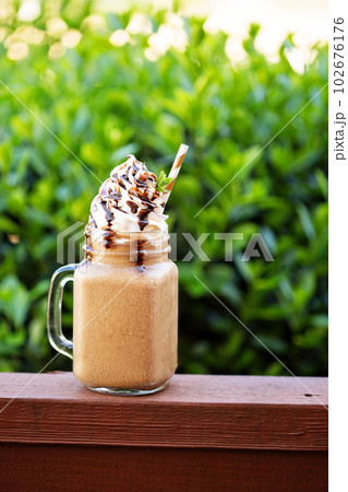 Chocolate frappe coffee with whipped cream outside Chocolate frappe coffee with whipped cream outside 102676176