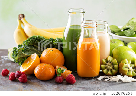 Variety of fresh vegetable and fruit juices Variety of fresh vegetable and fruit juices 102676259