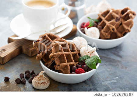 Chocolate waffles with meringues and coffee 102676287