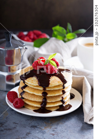 Stack of fluffy buttermilk pancakes Stack of fluffy buttermilk pancakes 102676304