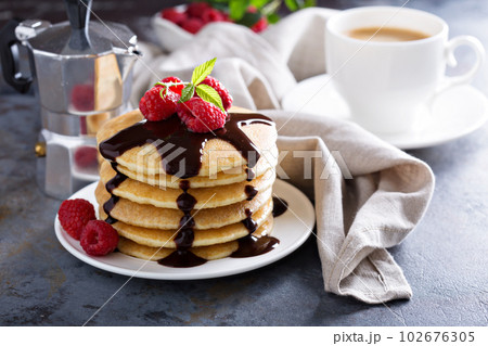 Stack of fluffy buttermilk pancakes Stack of fluffy buttermilk pancakes 102676305