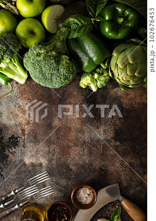 Variety of green vegetables and fruits 102676453