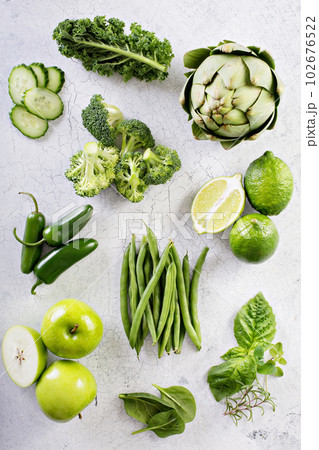 Variety of green vegetables and fruits 102676522
