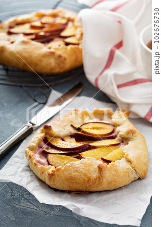 Open pie with plums Open pie with plums 102676730