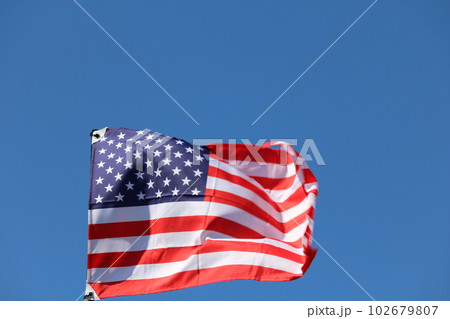 風になびくアメリカ国旗 USA flag streaming in wind 風になびくアメリカ国旗 USA flag streaming in wind 102679807