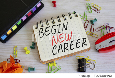 Begin new career symbol. Concept word Begin new career on white notebook. Beautiful wooden background. Business and Begin new career concept. Copy space Begin new career symbol. Concept word Begin new career on white notebook. Beautiful wooden background. Business and Begin new career concept. Copy space 102680498
