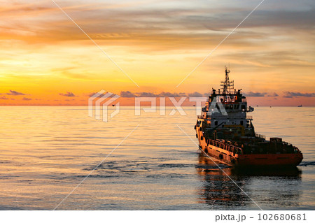 Offshore oil and gas industry and operated by technician petroleum. Worker walking to oil and gas plant for work as routine plan. Maintenance and Operation work scope in oil and gas plant. 102680681