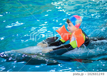 Treatment of children by means of dolphins Treatment of children by means of dolphins 102681249