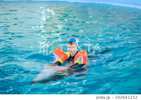 Treatment of children by means of dolphins Treatment of children by means of dolphins 102681252