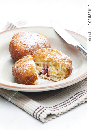 homemade donut filled with marmalade 102682619