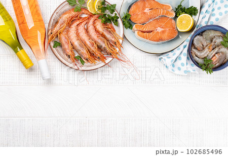 Seafood and Wine on a Table 102685496