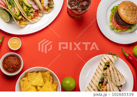 Mexican food featuring tacos, burritos, nachos, burgers 102685539